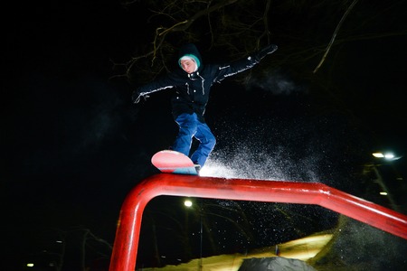 Khabarovsk, Russia - January 24 . 2016: Snowboarder jumping at nightのeditorial素材