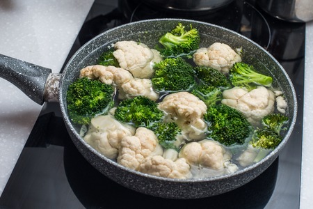 cooked broccoli and cauliflowerの写真素材