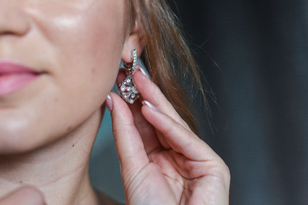 Lovely girl wears jewelryの写真素材