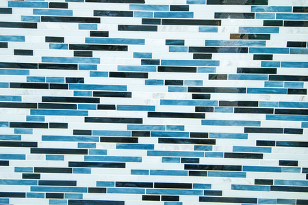 closeup of white brick wall with blue paintの写真素材