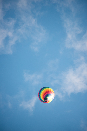 Hot-air balloons cloudy blue skyの写真素材