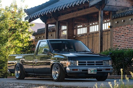 Khabarovsk, Russia - August 28, 2016 : car Nissan Datsun pickup truck on the street, around the houseのeditorial素材