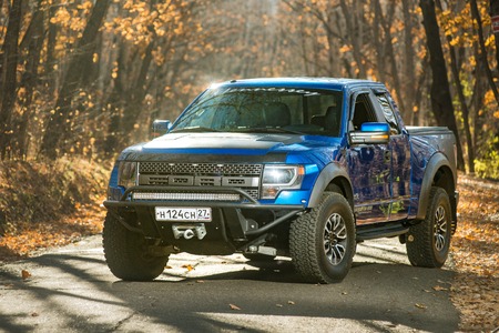 Khabarovsk, Russia - october 20, 2016: Ford F150 Raptor SUV is on the road driving on dirt
