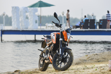 Khabarovsk, Russia - July 27, 2014 : motorcycle KTM Duke stands on the shore of a lake in Khabarovsk...