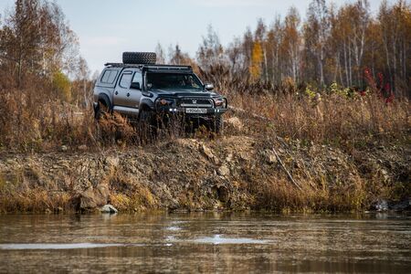 KHABAROVSK, RUSSIA - october 7, 2018: Toyota Tacoma quick ride on a offroadのeditorial素材