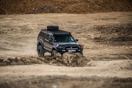 KHABAROVSK, RUSSIA - october 7, 2018: Toyota Tacoma quick ride on a offroad
