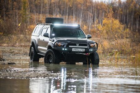 KHABAROVSK, RUSSIA - october 7, 2018: Toyota Tacoma quick ride on a offroad