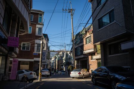 SEOUL, SOUTH KOREA - Desember, 2018: People wander in the walking street of the Myeong-dong shopping...