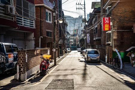 SEOUL, SOUTH KOREA - Desember, 2018: People wander in the walking street of the Myeong-dong shopping and entertainment district at nightのeditorial素材