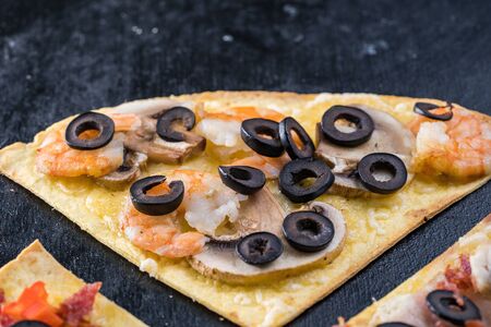 Assorted pizza slices. Margherita, pepperoni, four cheese pizza. Top view. Different types of pizza...