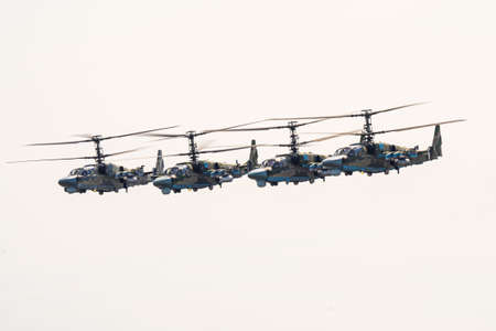Russia, Khabarovsk - May 9, 2020: K-52 helicopters alligator fly in formation Parade in honor of...
