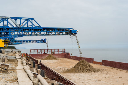 Industrial belt conveyor moving raw materials from mineの写真素材