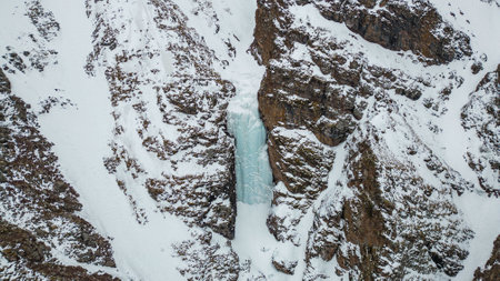 Frozen waterfall in Kyrgyzstan. Shamsi Gorge
