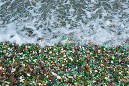 sea foam on the glass beachの写真素材