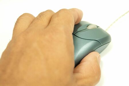 Big hand and small mouse on isolate background.の写真素材