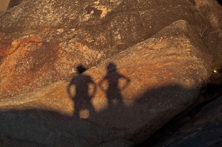 Silhouette of myself and wife at Kao Seng Mountain, Songkhla, Thailand.の写真素材