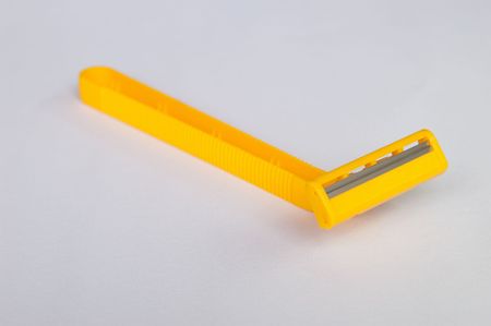 Yellow brard trimmer on isolate background.の写真素材