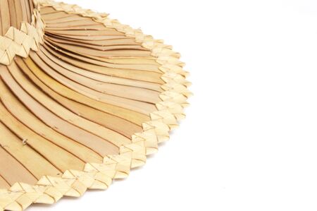 Closeup hat from palm leaves on isolate background.の写真素材