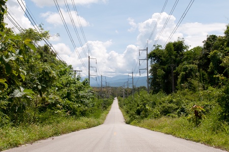 Road and electric lien at Northern, Thailand.の写真素材