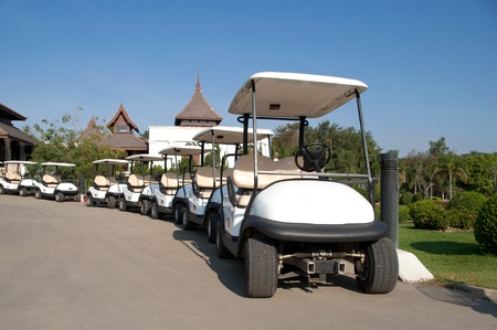 White golf cart in golf club の写真素材