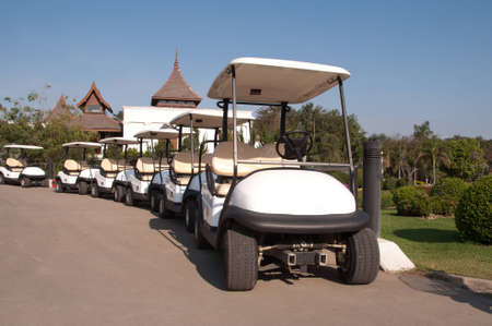 White golf cart in golf club の写真素材