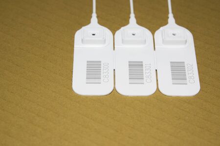 Seal plastic and barcode numbering for security.の写真素材