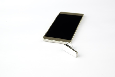 Smart phone and Wireless headset on isolated background.の写真素材