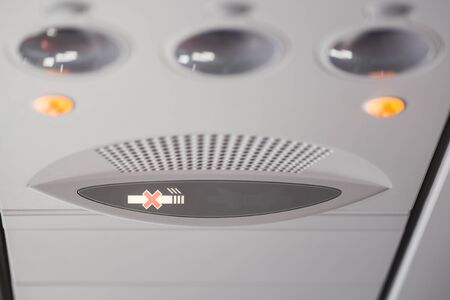 No smoking, light sign on airplane.の写真素材