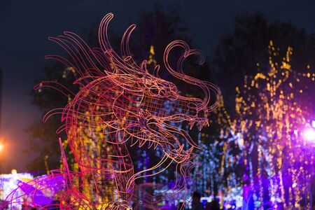 Head of a dragon at Thailand LED Festival.の写真素材