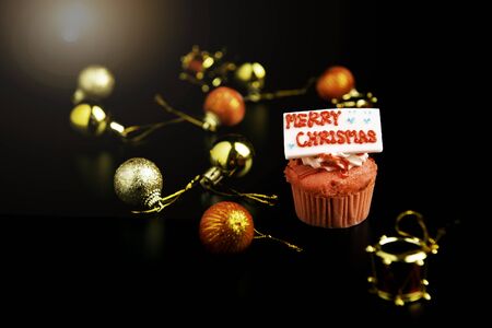 Festive Christmas cupcakes with frosting and sugar decoration.の写真素材