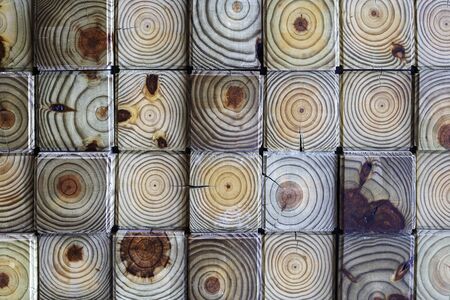 Brown Wood pattern of cross section. Crosscut lumber blocks. Wood texture.の写真素材