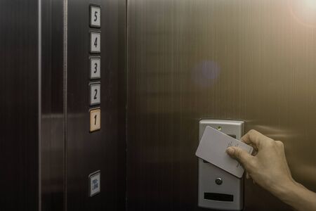 Proximity card keyless to authenticate for unlock elevator befor up or down.の写真素材