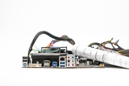Motherboard for personal computer, connector, socket, port, jack and Manual book on  white...
