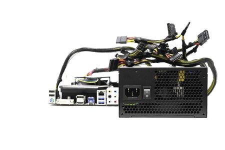 Black power supply for testing Motherboard personal computer on isolated white background.の写真素材