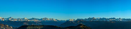 Panorama landscape view of Alps in Switzerland from the top of Rigi Kulm on twilight time.