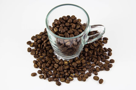 coffee beans with glass on white backgroundの写真素材
