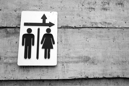 toilet sign on wood wallの写真素材