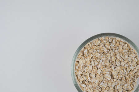 top view of oatmeal bowl on white backgroundの写真素材