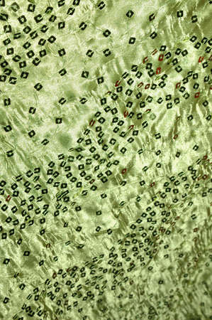 Elegant green silk with sequins.