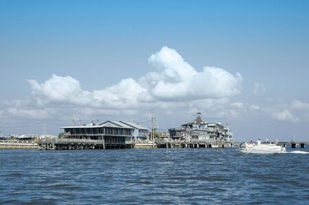 The waterfront at Cedar Key, Florida from the channel in the Gulf of Mexico.の写真素材