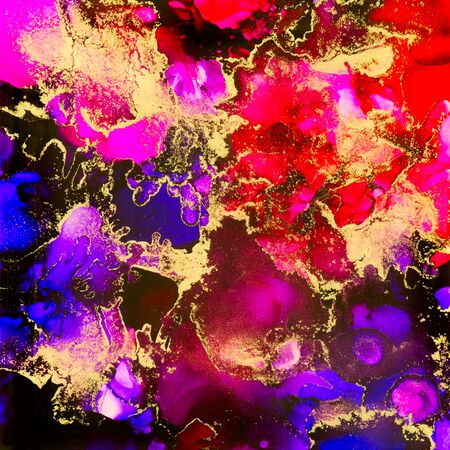 Red and purple shades and gold dust in alcohol inks.の写真素材