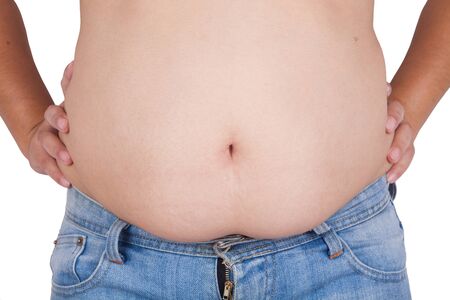 abdominal surface of fat woman on white backgroundの写真素材
