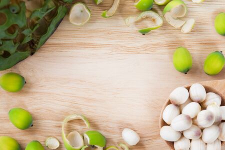 frame of lotus seed on wooden blockの写真素材