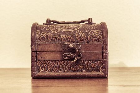 small box old-fashioned on the wood tableの写真素材
