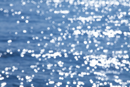 blurry background of bokeh on water seaの写真素材