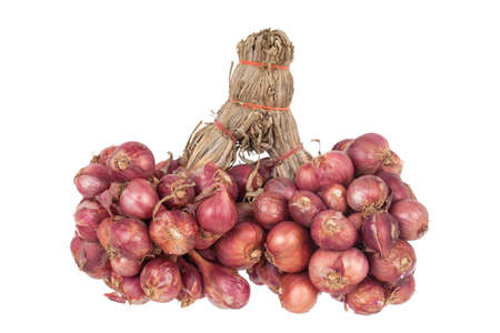 Shallot bunch isolated on white backgroundの写真素材