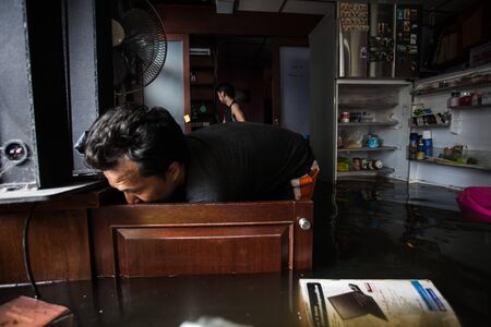 Nonthaburi flood in Thailand 2011-The lifestyle of people in massive flooding, Nonthaburi in Thailand, October 28, 2011のeditorial素材