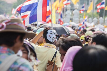 BANGKOK-December 9 : The Thai people protest against the government of Yingluck Shinawatra on the road around Government House  on December 9, 2013 in Bangkok, Thailand.のeditorial素材