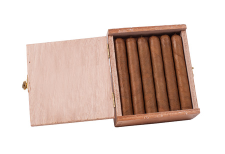 Cigars in wood box brown on white background.の写真素材