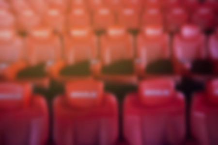 Blurry background of red seat in the movie theater.の写真素材